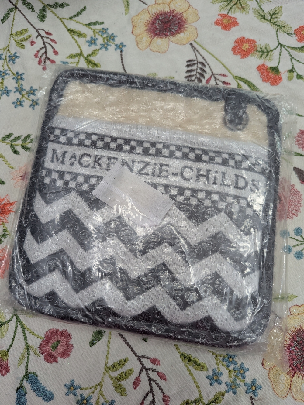New. Mackenzie-Childs set of two potholders.